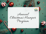Image of Christmas Decorations with Text 'Annual Christmas Hamper Program'