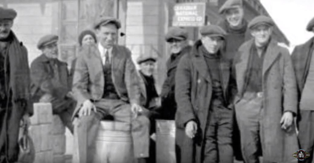 Image of men in town likely Spirit River - from South Peace Regional Archives