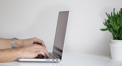 Image of Person Using a Laptop