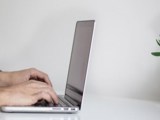 Image of Person Using a Laptop