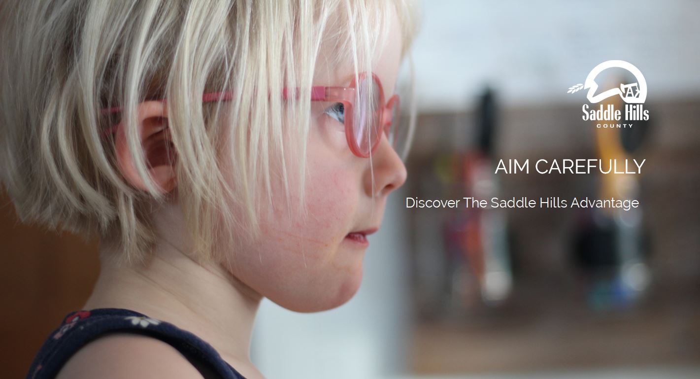 Image of girl staring at computer screen