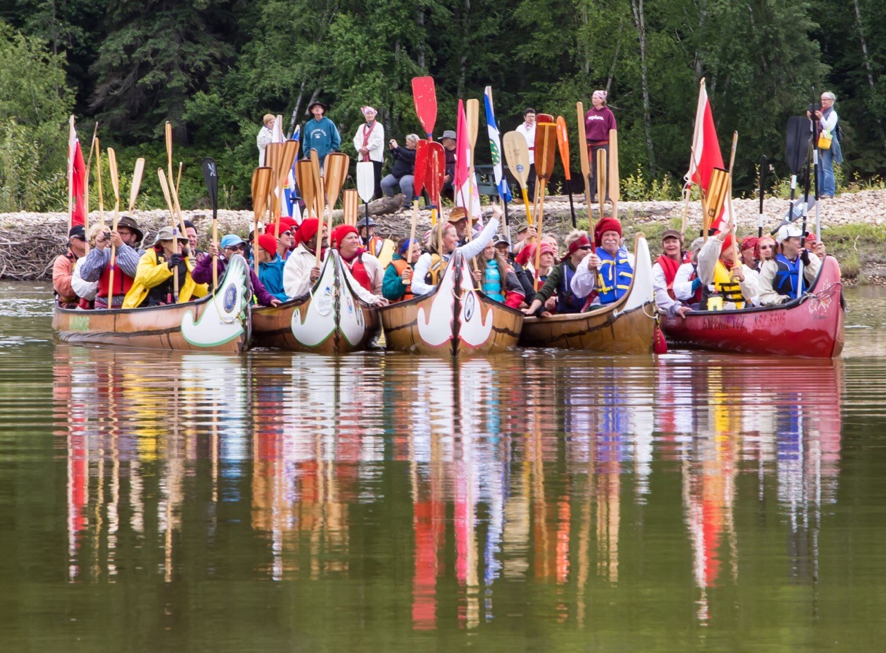 Image of canoeists leaving shore